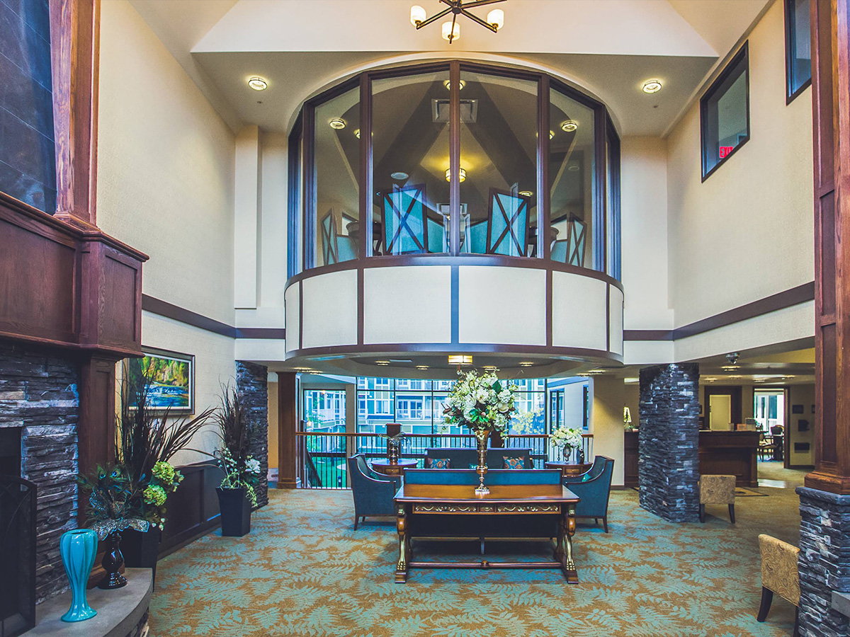 Interior balcony and chandelier at Rocky Ridge Retirement Community